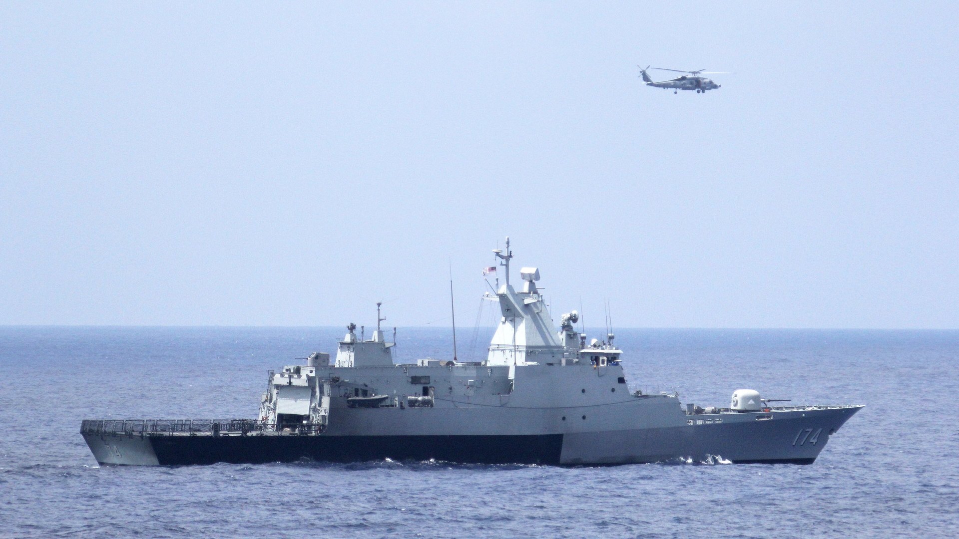 An offshore patrol vessel at sea, seen from the side